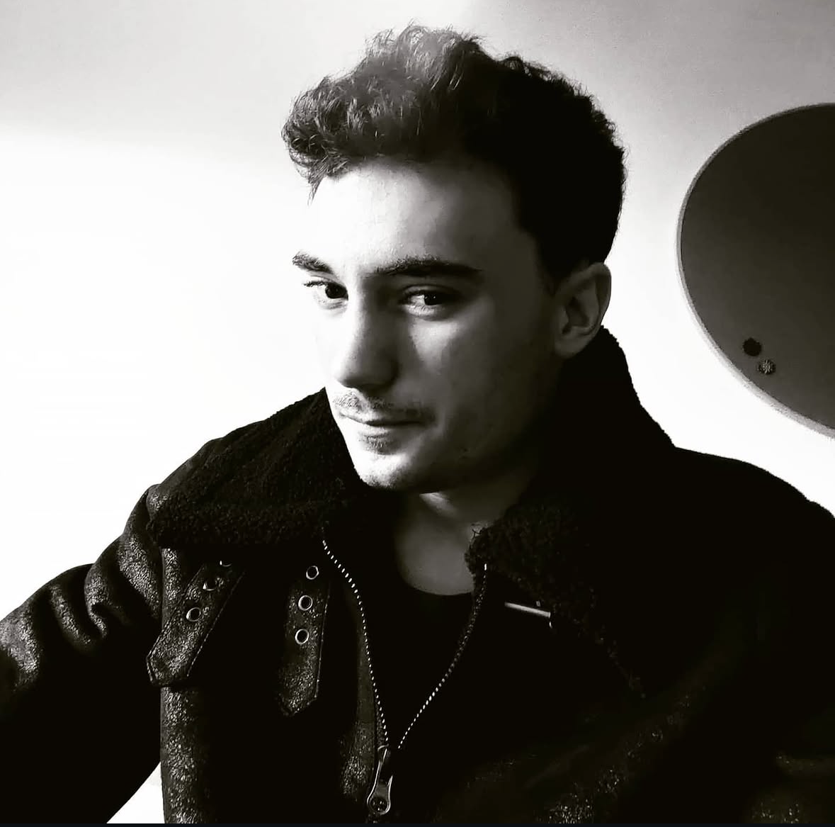 Black-and-white portrait of Sam Garbutt